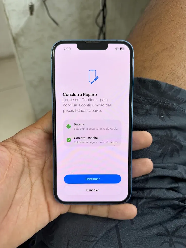 iPhone após a troca de bateria e da câmera traseira, com a tela de conclusão do reparo